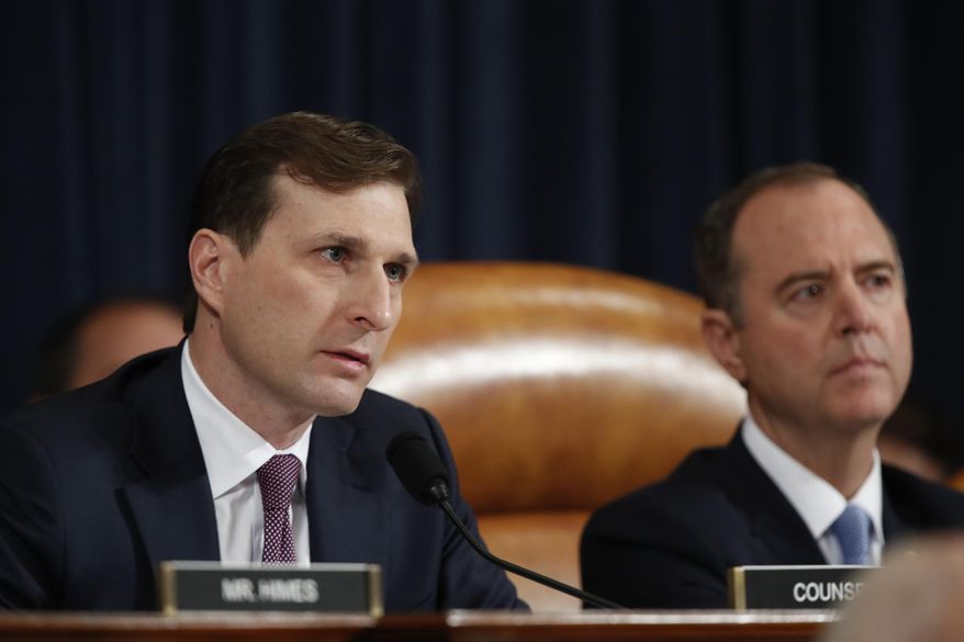 Daniel Goldman, director of investigations for the House Intelligence Committee majority staff, left, asks questions to top U.S. diplomat in Ukraine William Taylor and career Foreign Service officer George Kent, as they testify before the House Intelligence Committee on Capitol Hill in Washington, Wednesday, Nov. 13, 2019, during the first public impeachment hearing of President Donald Trump&#39;s efforts to tie U.S. aid for Ukraine to investigations of his political opponents. House Intelligence Committee Chairman Rep. Adam Schiff, D-Calif., right, looks on. (AP Photo/Alex Brandon)