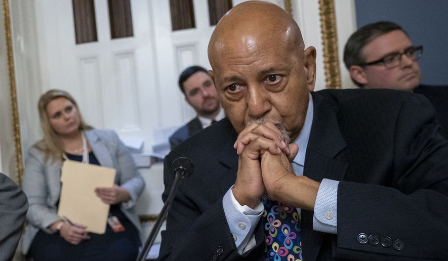 In this Oct. 30, 2019, file photo, Rep. Alcee Hastings, D-Fla., listens at the Capitol in Washington. The House Ethics Committee says it is investigating Hastings’ relationship with his longtime girlfriend, who works on his staff. (AP Photo/J. Scott Applewhite, File)
