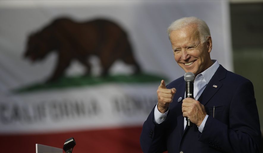 Democratic presidential candidate former Vice President Joe Biden smiles as he holds a campaign rally at Los Angeles Trade Technical College in Los Angeles Thursday, Nov. 14, 2019. (AP Photo/Damian Dovarganes)