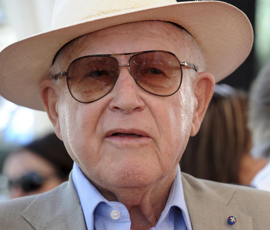 FILE - In this Wednesday Aug. 20, 2008 file photo, Croatian born movie producer Branko Lustig looks on at the festival square during the Sarajevo Film Festival, in Sarajevo. Lustig, an Oscar-winning Croatian film producer and Holocaust survivor, has died at 87. The Yad Vashem center in Jerusalem said Lustig died Thursday, Nov. 14, 2019 in Zagreb, the capital of his native Croatia. Lustig is best known for winning Academy Awards for Best Picture for Steven Spielberg’s “Schindler's List” and for Ridley Scott’s “Gladiator.” (AP Photo/Hidajet Delic, file)
