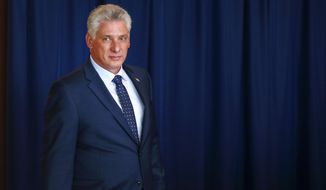 FILE - In this Sept. 26, 2018 file photo, Cuba&#39;s President Miguel Diaz-Canel arrives for a meeting with the United Nations secretary-general, on the sidelines of the 73rd session of the U.N. General Assembly, at U.N. headquarters. Díaz-Canel is making his first trip to the town of Caimanera, the closest point in Cuba to the U.S. naval base at Guantanamo Bay. He arrived on Thursday morning, Nov. 14, 2019. (AP Photo/Jason DeCrow, File)