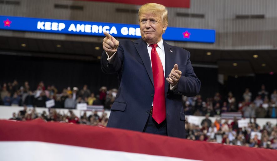 President Donald Trump arrives to speak at a campaign rally at the CenturyLink Center, Thursday, Nov. 14, 2019, in Bossier City, La. (AP Photo/ Evan Vucci)
