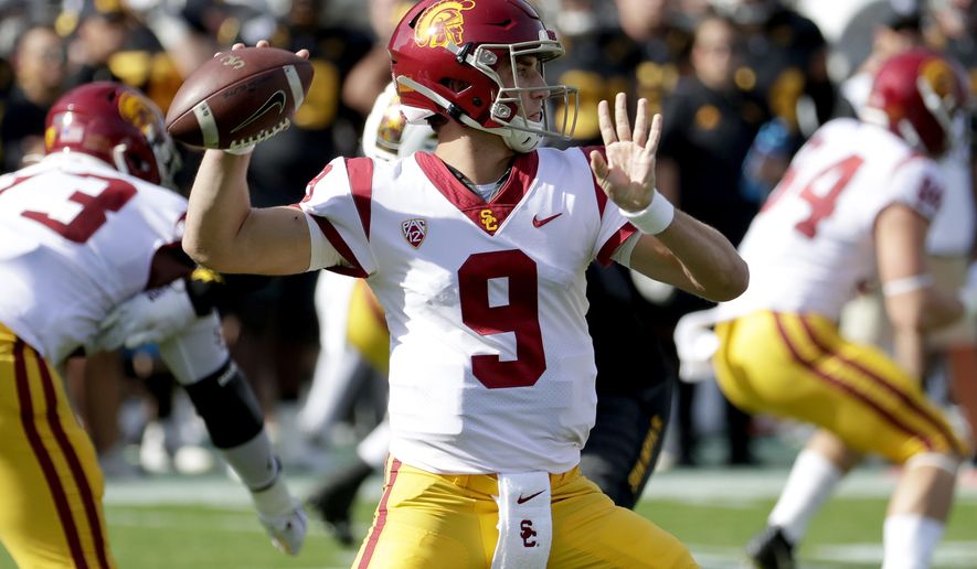 Southern California quarterback Kedon Slovis (9) throws the ball against Arizona State during the first half of an NCAA college football game, Saturday, Nov. 9, 2019, in Tempe, Ariz. (AP Photo/Matt York)
