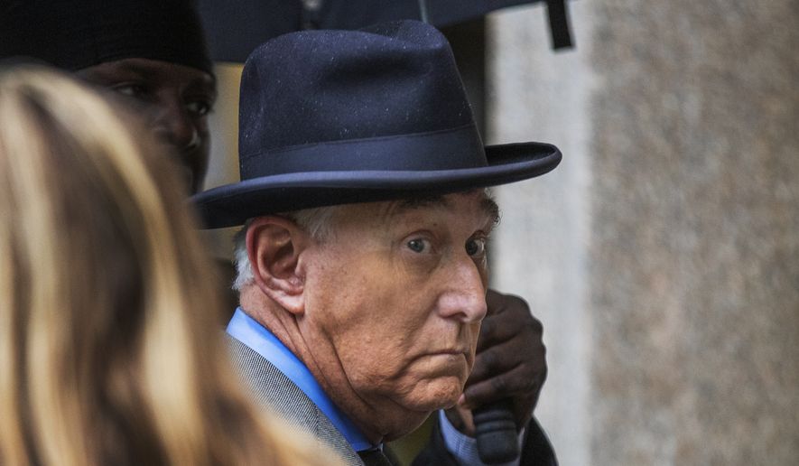 In this Nov. 12, 2019 file photo, Roger Stone, a longtime Republican provocateur and former confidant of President Donald Trump, waits in line at the federal court in Washington. (AP Photo/Manuel Balce Ceneta)