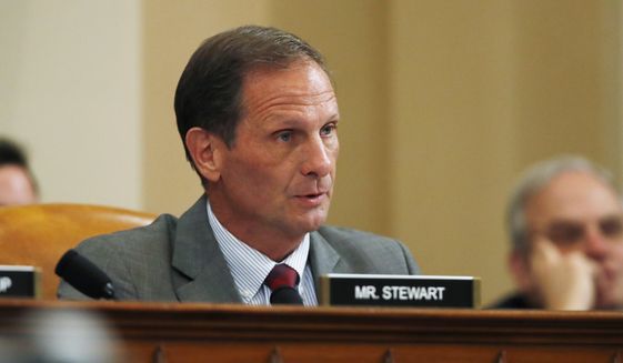 Rep. Chris Stewart, R-Utah, questions former Ambassador to Ukraine Marie Yovanovitch as she testifies before the House Intelligence Committee on Capitol Hill in Washington, Friday, Nov. 15, 2019, during the second public impeachment hearing of President Donald Trump&#39;s efforts to tie U.S. aid for Ukraine to investigations of his political opponents. (AP Photo/Alex Brandon)