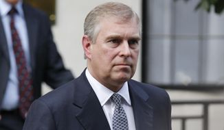 In this June 6, 2012, file photo, Britain&#x27;s Prince Andrew leaves King Edward VII hospital in London after visiting his father Prince Philip. (AP Photo/Sang Tan, File) ** FILE **