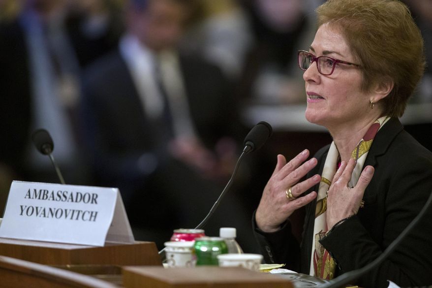 Former U.S. Ambassador to Ukraine Marie Yovanovitch testifies before the House Intelligence Committee on Capitol Hill in Washington, Friday, Nov. 15, 2019, during the second public impeachment hearing of President Donald Trump's efforts to tie U.S. aid for Ukraine to investigations of his political opponents. (AP Photo/Alex Brandon)