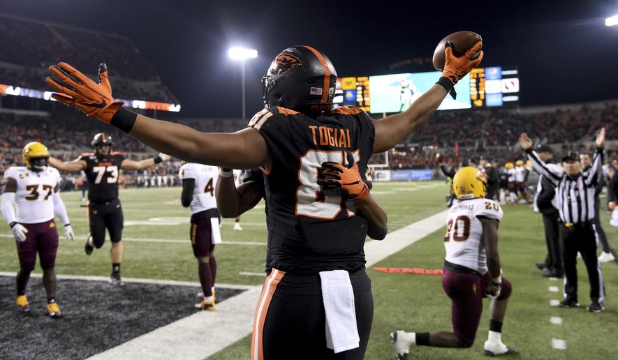 Oregon State tight end Noah Togiai celebrates after scoring a touchdown during the second half of an NCAA college football game against Arizona State in Corvallis, Ore., Saturday, Nov. 16, 2019. (AP Photo/Steve Dykes)