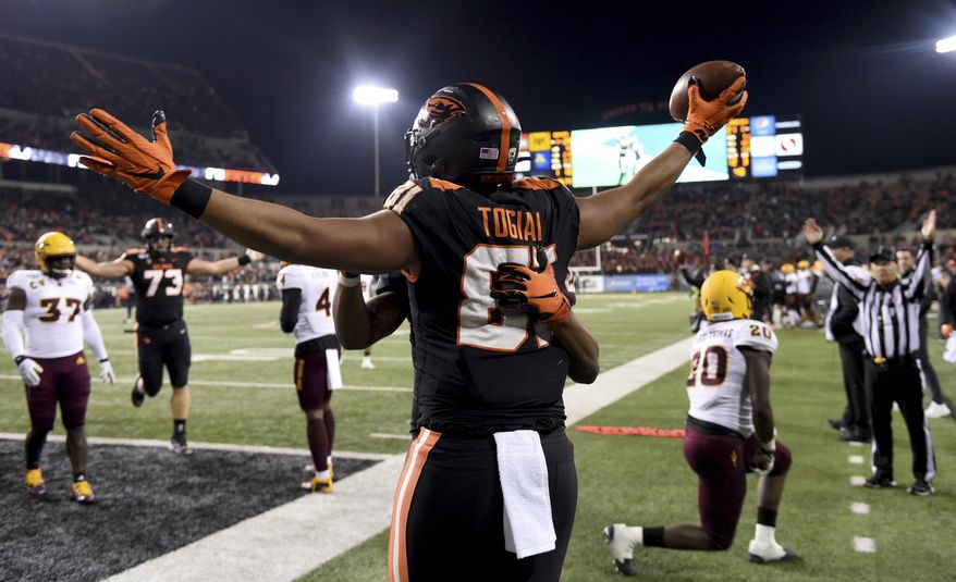 Oregon State tight end Noah Togiai celebrates after scoring a touchdown during the second half of an NCAA college football game against Arizona State in Corvallis, Ore., Saturday, Nov. 16, 2019. (AP Photo/Steve Dykes)