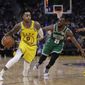 Golden State Warriors&#39; D&#39;Angelo Russell, left, drives the ball past Boston Celtics&#39; Kemba Walker (8) during the second half of an NBA basketball game Friday, Nov. 15, 2019, in San Francisco. (AP Photo/Ben Margot)