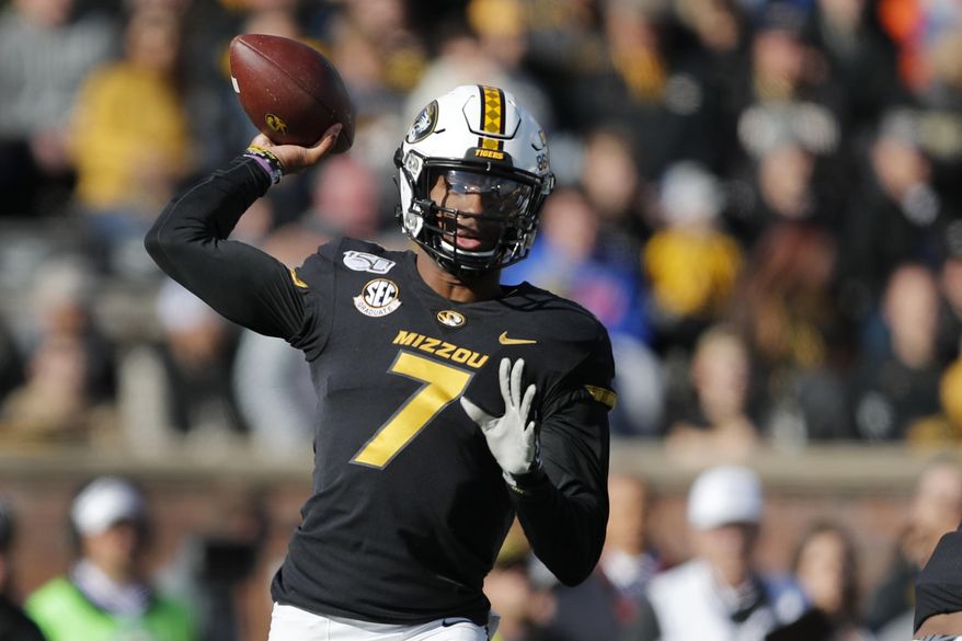 Missouri quarterback Kelly Bryant throws during the first half of an NCAA college football game against Florida, Saturday, Nov. 16, 2019, in Columbia, Mo. (AP Photo/Jeff Roberson)