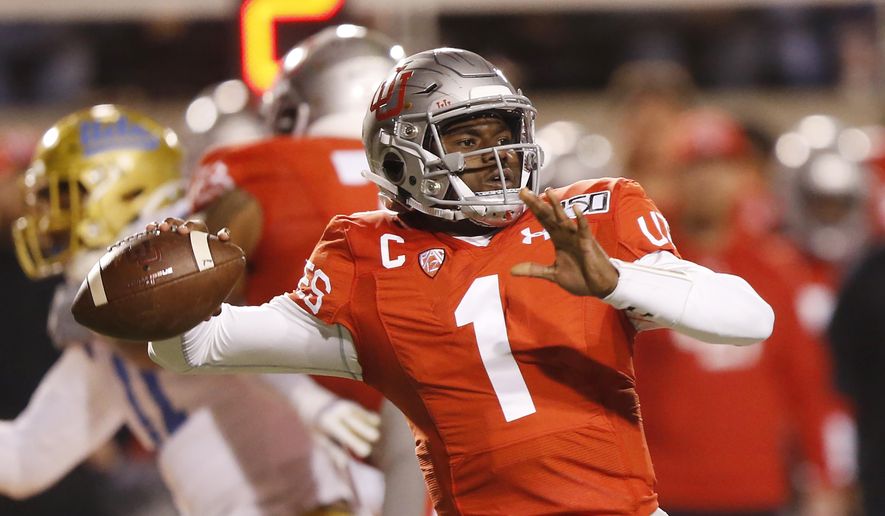 Utah quarterback Tyler Huntley (1) passes the ball against UCLA in the first half during an NCAA college football game Saturday, Nov. 16, 2019, in Salt Lake City. (AP Photo/Rick Bowmer)