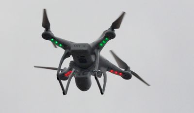 Drones can distract pilots and damage aircraft, so the Federal Aviation Administration prohibits their flight in controlled airspaces and generally bans them from within 5 miles of airports. (Associated Press/File)