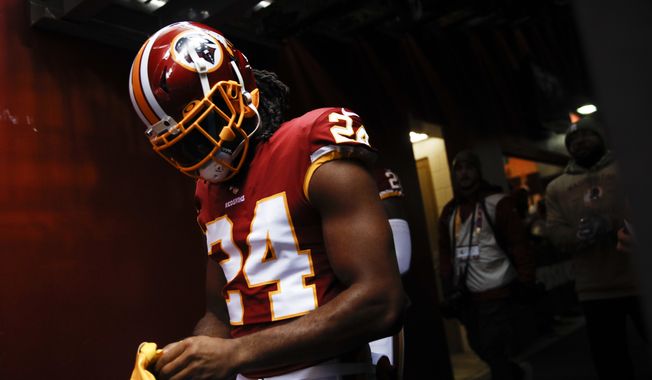 Washington Redskins cornerback Josh Norman (24) walk onto the field before the first half of an NFL football game between the Washington Redskins and the New York Jets Sunday, Nov. 17, 2019, in Landover, Md. (AP Photo/Patrick Semansky) ** FILE **