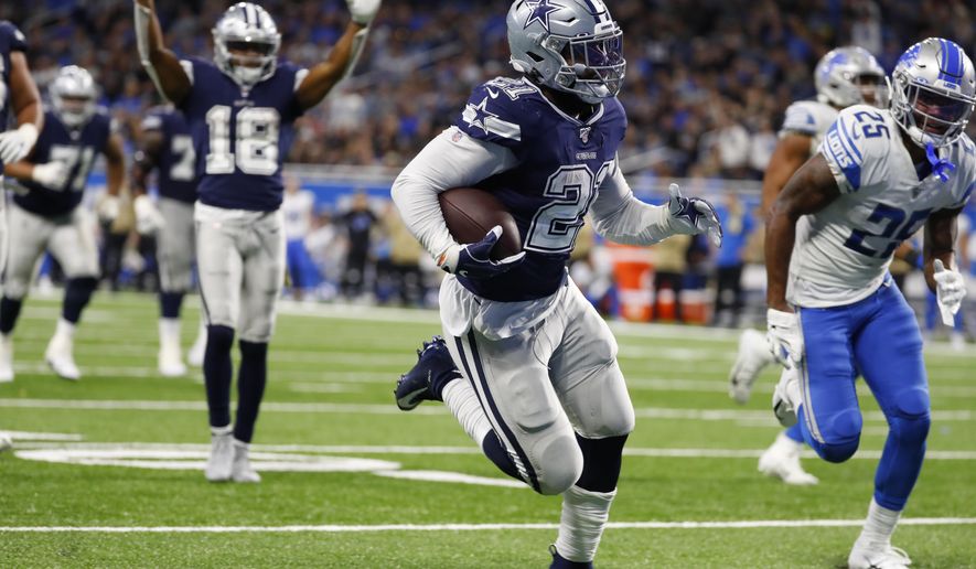 Dallas Cowboys running back Ezekiel Elliott (21) runs into the end zone for a touchdown during the second half of an NFL football game against the Detroit Lions, Sunday, Nov. 17, 2019, in Detroit. (AP Photo/Paul Sancya)