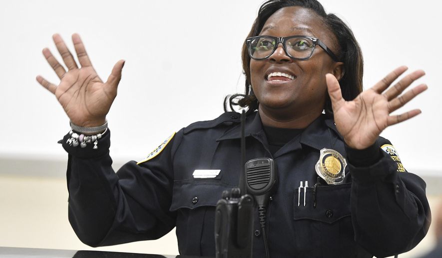School resources Officer Angela Booker saw a need for a summer camp for girls with special needs. So she started one. With her own money. On her own time. Thursday, Nov. 7, 2019, in Nashville, Tenn. (Larry McCormack/The Tennessean via AP)