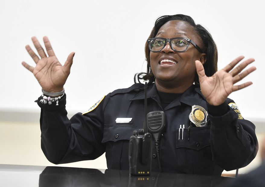 School resources Officer Angela Booker saw a need for a summer camp for girls with special needs. So she started one. With her own money. On her own time. Thursday, Nov. 7, 2019, in Nashville, Tenn. (Larry McCormack/The Tennessean via AP)