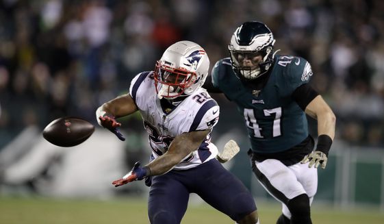 New England Patriots&#39; James White (28) catches a pass against Philadelphia Eagles&#39; Nate Gerry (47) during the second half of an NFL football game, Sunday, Nov. 17, 2019, in Philadelphia. (AP Photo/Matt Rourke)