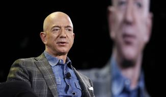 Amazon CEO Jeff Bezos speaks at the the Amazon re:MARS convention, Thursday, June 6, 2019, in Las Vegas. (AP Photo/John Locher)