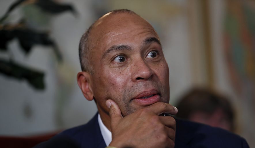 Democratic presidential candidate former Massachusetts Gov. Deval Patrick speaks to local residents during a stop at the Sykora Bakery, Monday, Nov. 18, 2019, in Cedar Rapids, Iowa. (AP Photo/Charlie Neibergall)