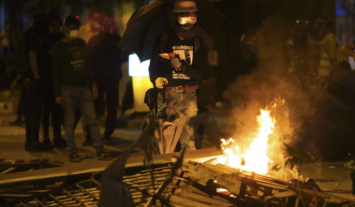 EDITORIAL: Beijing eroded Hong Kong's freedoms, now protesters want self-determination - Washington Times