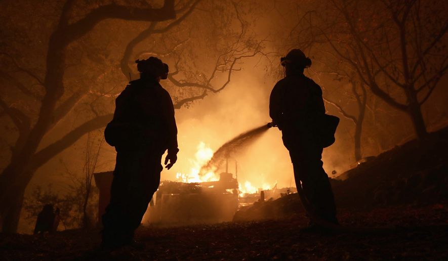 PARADISE, CALIFORNIA - NOVEMBER 09:  West Sacramento firefighters battle the Camp Fire on Honey Run Road in Paradise, Calif., on Friday, Nov. 9, 2018. (Ray Chavez/Digital First Media/The Mercury News via Getty Images)
