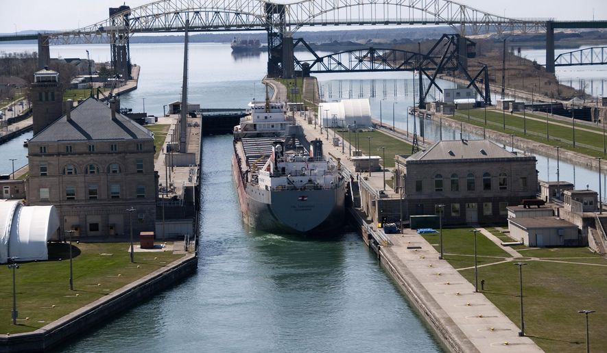 A ship navigates the Soo Locks between Lake Superior and Lake Huron on the St. Mary&#39;s River on United States (Michigan) and Canadian border. Image courtesy of the U.S. Army Corps of Engineers - Detroit District.