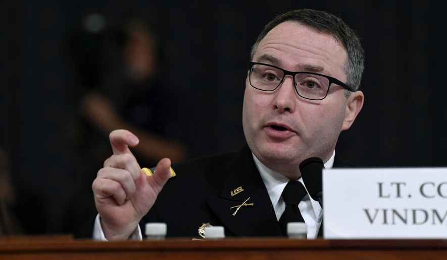 National Security Council aide Lt. Col. Alexander Vindman testifies before the House Intelligence Committee on Capitol Hill in Washington, Tuesday, Nov. 19, 2019, during a public impeachment hearing of President Donald Trump&#39;s efforts to tie U.S. aid for Ukraine to investigations of his political opponents. (AP Photo/Susan Walsh)