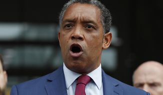 In this Oct. 5, 2017, file photo, District of Columbia Attorney General Karl Racine speaks at One Judiciary Square in Washington. (AP Photo/Carolyn Kaster, File)
