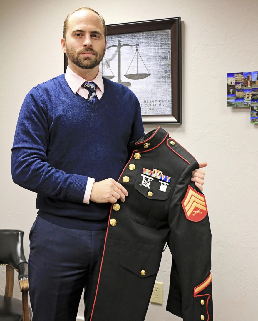 In this recent photo, Brendan Rice, an attorney who served in Afghanistan has become an advocate for veterans in the community and in veterans affairs, poses in Scottsbluff, Neb.. Rice is accredited with the Department of Veterans Affairs, to help area veterans with benefits and other matters. Prior to being an attorney, he served a nearly six-month deployment to Afghanistan with the Marine Corps Reserve. (Maunette Loeks/The Star-Herald via AP)
