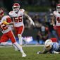 Kansas City Chiefs strong safety Tyrann Mathieu, right, runs after an interception during the first half of an NFL football game against the Los Angeles Chargers, Monday, Nov. 18, 2019, in Mexico City. (AP Photo/Rebecca Blackwell)