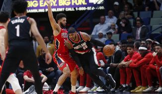 Portland Trail Blazers forward Carmelo Anthony (00) drives to the basket against New Orleans Pelicans guard Josh Hart (3) in the first half of an NBA basketball game in New Orleans, Tuesday, Nov. 19, 2019. (AP Photo/Gerald Herbert)