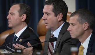Then-Rep. Devin Nunes, R-Calif., at the time the ranking member of the House Intelligence Committee, joined at left by Chairman Adam Schiff, D-Calif., questions National Security Council aide Lt. Col. Alexander Vindman, on Capitol Hill in Washington, Tuesday, Nov. 19, 2019. U.S. lawmakers are investigating whether the Chinese government is attempting to control one of America&#39;s beacons of free market capitalism — Forbes Global Media Holdings. Republicans on the House Permanent Select Committee on Intelligence began probing the issue in late 2021, according to government documents obtained by The Washington Times. &quot;It is essential for you to be informed of any malign influence efforts related to your company and how such efforts impact American economic and security interests,&quot; then-Rep. Devin Nunes, California Republican, wrote in the letter. (AP Photo/J. Scott Applewhite)