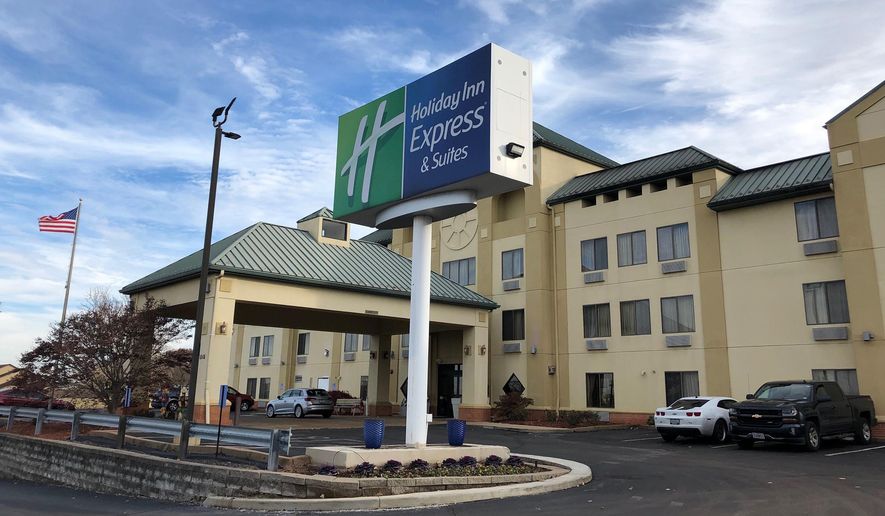 This photo shows the Holiday Inn in Fenton, Mo, Wednesday, Nov. 20, 2019. An elderly woman who feared she was developing dementia removed her mentally disabled adult daughter from a care facility, then fatally stabbed her in a suburban St. Louis hotel before attempting to kill herself, police and relatives say. Marjorie Theleman, was charged Tuesday with first-degree murder and armed criminal action in the death of her daughter, Sharon Theleman, after police were summoned to a hotel in Fenton because the pair had not checked out. (AP Photo/Jim Salter)