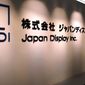 This July, 2017, photo, shows the logo of Japan Display Inc. in Tokyo. The Tokyo-based maker of displays said Thursday, Nov. 21, 2019, it is pursuing criminal charges against an employee it has accused of taking 578 million yen ($5.4 million) in fake deals. (Kyodo News via AP)