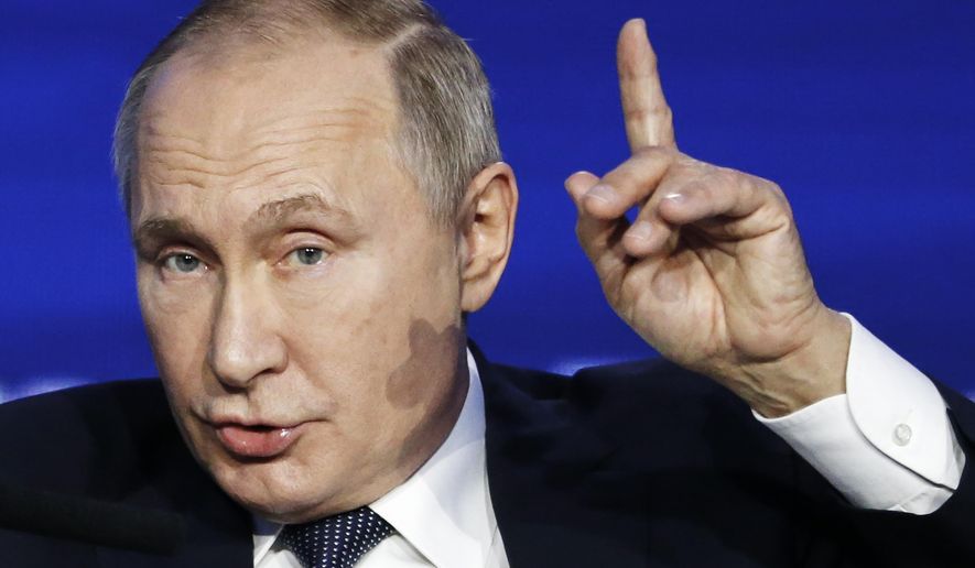 Russian President Vladimir Putin speaks during an annual VTB Capital "Russia Calling!" Investment Forum in Moscow, Russia, Wednesday, Nov. 20, 2019. (AP Photo/Alexander Zemlianichenko, Pool)