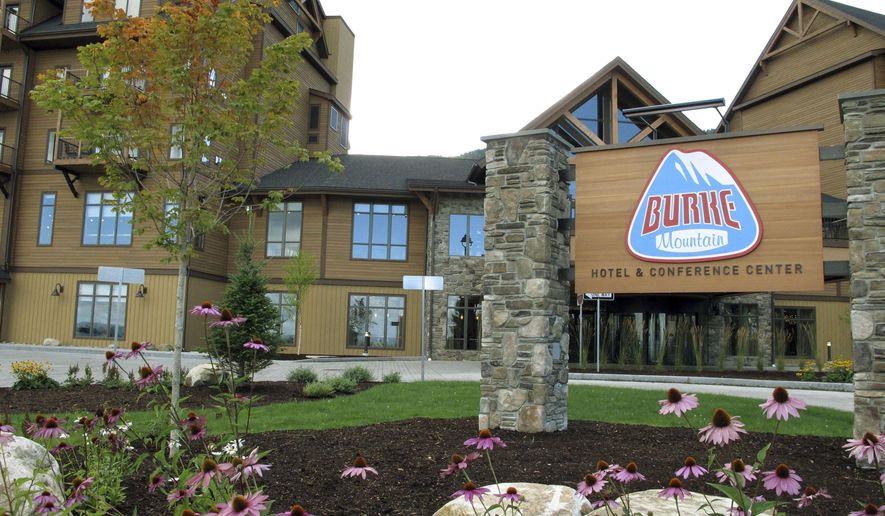 FILE - In this Sept. 1, 2016, file photo, the Lodge at Burke Mountain is pictured on the day it officially opened in East Burke, Vt. Foreigners who invested in the Jay Peak and Burke Mountain ski area developments that are now linked to alleged fraud say the federal government is declining to act on their petitions for U.S. residency. A federal lawsuit filed in Florida on Friday, Nov. 13, 2019, accuses the U.S. Citizenship and Immigration Services of leaving their residency petitions in limbo. The agency declined comment. (AP Photo/Lisa Rathke, File)