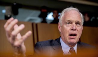 In this Oct. 29, 2019, file photo, Sen. Ron Johnson, R-Wis., appears on Capitol Hill in Washington. (AP Photo/Andrew Harnik File)