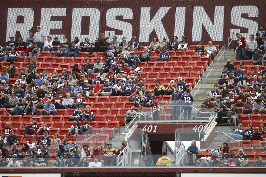  In this Oct. 6, 2019, file photo, fans watch play between the Washington Redskins and the New England Patriots during the second half of an NFL football game, in Landover, Md. There were more than 20,000 empty seats for the Redskins’ last home game, and when many of them have been filled this season, it’s with fans of the visiting team. It could be even emptier Sunday when the 1-9 Redskins host the 3-6-1 Detroit Lions. (AP Photo/Patrick Semansky, File)  **FILE**