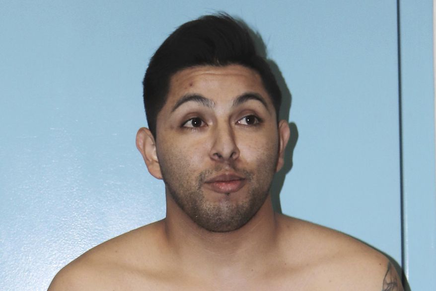 This undated booking photo released by the Anaheim , Calif., Police Department on Wednesday, Nov. 21, 2019 shows Antonio Silva. Authorities say they've made an arrest in the killing of a Southern California man, Adrian Darren Bonar, whose body was found in a car trunk, and they also rescued a kidnap victim who was being held for ransom. Anaheim police announced Wednesday that Silva, 27, was arrested two days ago when SWAT teams from several agencies raided his home in neighboring Santa Ana. (Anaheim Police Department via AP)