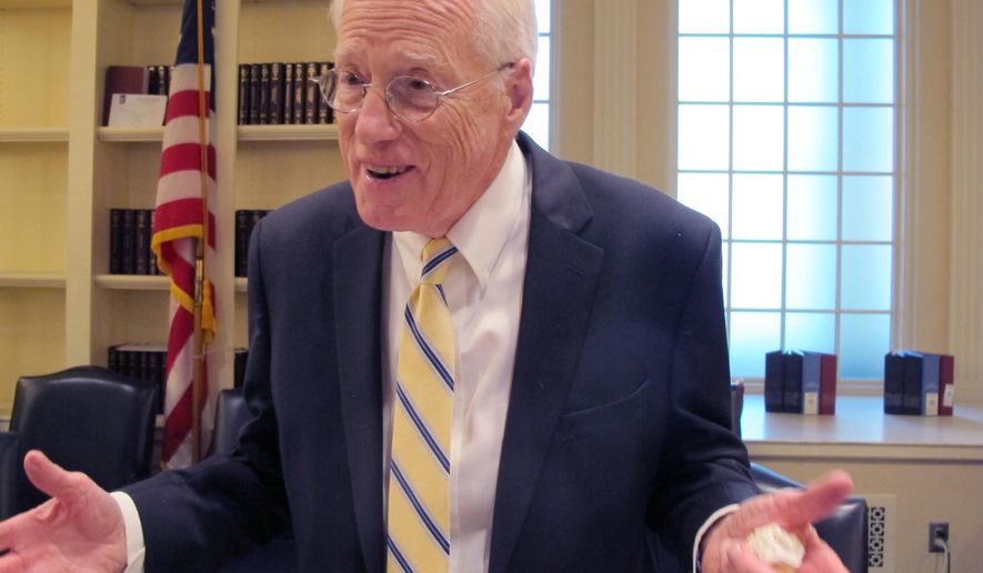 William Kirwan, who is the chairman of a Maryland commission on education funding, talks to reporters on Thursday, Nov. 21, 2019, in Annapolis, Md., after the panel voted on a sweeping package of recommendations to enhance K-12 education in the state. The recommendations, which would increase funding by billions of dollars over the next decade, now go to the Maryland General Assembly, which will take them up in the next legislative session. (AP Photo/Brian Witte)