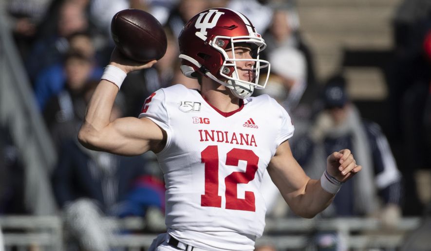 Indiana quarterback Peyton Ramsey (12) passes in the first quarter of an NCAA college football game against Penn State in State College, Pa., on Saturday, Nov. 16, 2019. (AP Photo/Barry Reeger)