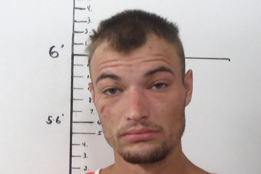 This undated photo provided by the Mercer County Sheriff's Office & Jail in Princeton, Mo., shows Drake Kately. Authorities say Kately, an inmate who escaped twice from a Missouri jail was captured more than 1,000 miles away in Delaware where he was living in a makeshift hut in a wooded area. The U.S. Marshals Service said in a news release that Kately, of Kansas City, Missouri, was captured Tuesday, Nov. 19, 2019 near New Castle, Delaware.(Mercer County Sheriff's Office & Jail via AP)