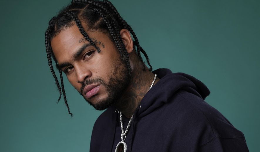 FILE - This July 26, 2019 file photo shows rapper Dave East, a cast member in the Hulu series "Wu-Tang: An American Saga," posing for a portrait in Beverly Hills, Calif. “Survival,” which debuted at No. 11 on the Billboard Top 200 albums this week, is East’s official album debut, even though he’s been widely known in the hip-hop community for the past few years, releasing numerous popular mixtapes and EPs. He’s also collaborated with high profile artists such as Chris Brown, Meek Mill, 2 Chainz and Mac Miller. (Photo by Chris Pizzello/Invision/AP, File)