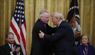 President Donald Trump greets Jon Voight during a National Medal of Arts and National Humanities Medal ceremony in the East Room of the White House, Thursday, Nov. 21, 2019, in Washington. (AP Photo/Alex Brandon)  **FILE**