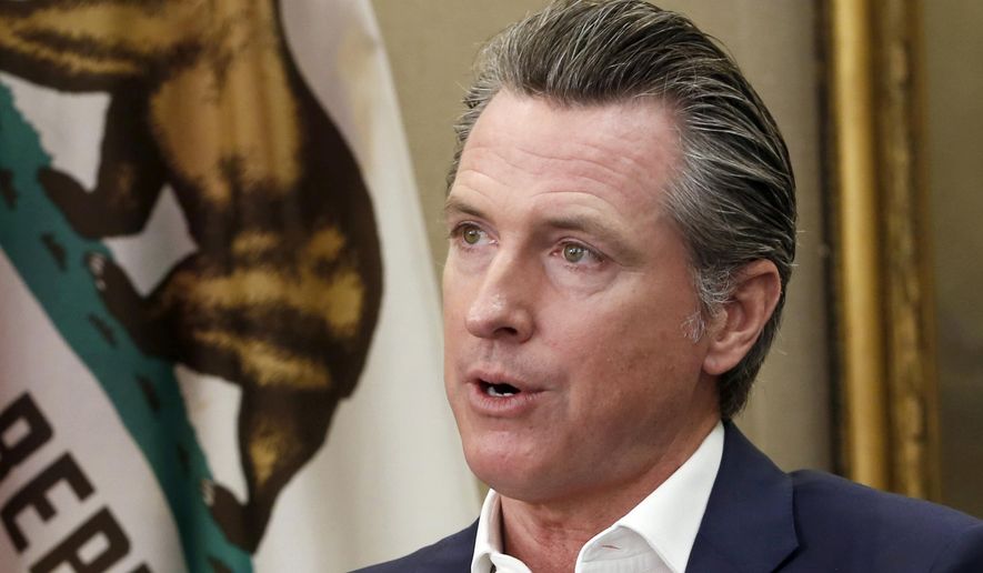 This Oct. 8, 2019, file photo, shows California Gov. Gavin Newsom during an interview in his office at the Capitol in Sacramento, Calif. California's Supreme Court rejected a state law that would have required President Donald Trump to disclose his tax returns to appear as a candidate in the state's primary election next spring. The justices on Thursday, Nov. 21, 2019 said the law that would have required tax returns for all presidential and gubernatorial candidates to appear on the primary ballot was unconstitutional. The state Republican Party challenged the bill signed into law by Newsom because it was aimed at Trump. (AP Photo/Rich Pedroncelli, File)