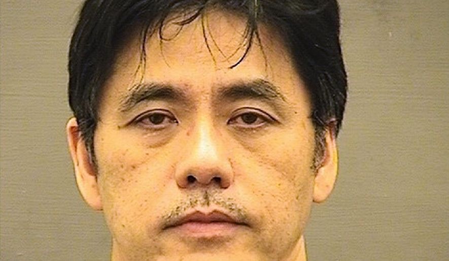 This undated file photo provided by the Alexandria Sheriff&#39;s Office shows Jerry Chun Shing Lee. The former CIA officer who pleaded guilty to an espionage conspiracy with China could be facing more than two decades in prison. Fifty-five-year-old Lee is scheduled for sentencing Friday, Nov. 22, 2019, in federal court in Alexandria, Va. (Alexandria Sheriff&#39;s Office via AP, File)