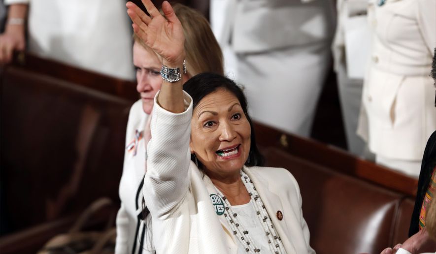 FILE - In this Feb. 5, 2019, file photo, U.S. Rep. Debra Haaland, D-N.M., arrives before President Donald Trump delivers his State of the Union address to a joint session of Congress on Capitol Hill in Washington. Democratic presidential hopeful Elizabeth Warren announced Friday, Nov. 22, 2019 she has named Haaland, U.S. Reps. Ayanna Pressley, D-Mass., and Katie Porter, D-Calif., as her campaign co-chairs. (AP Photo/J. Scott Applewhite, File)