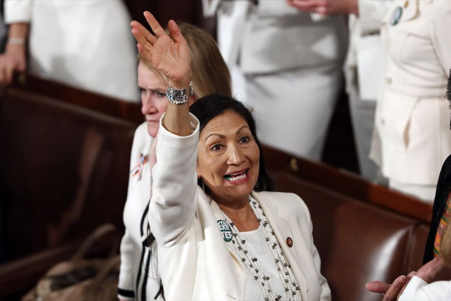 FILE - In this Feb. 5, 2019, file photo, U.S. Rep. Debra Haaland, D-N.M., arrives before President Donald Trump delivers his State of the Union address to a joint session of Congress on Capitol Hill in Washington. Democratic presidential hopeful Elizabeth Warren announced Friday, Nov. 22, 2019 she has named Haaland, U.S. Reps. Ayanna Pressley, D-Mass., and Katie Porter, D-Calif., as her campaign co-chairs. (AP Photo/J. Scott Applewhite, File)