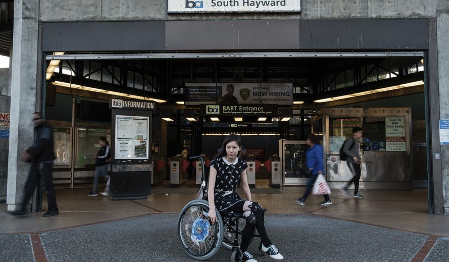 In this Thursday, Nov. 21, 2019 photo, Sophia Humphrey poses for a portrait at the South Hayward Bart Station in Hayward, Calif. Humphrey witnessed the killing of a good Samaritan on a San Francisco Bay Area commuter train. (Nick Otto/San Francisco Chronicle via AP)
